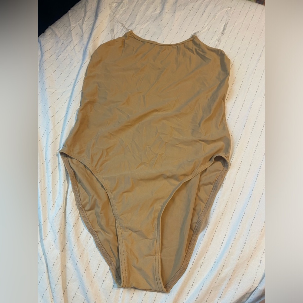 Never worn nude leotard women’s size XL NIB